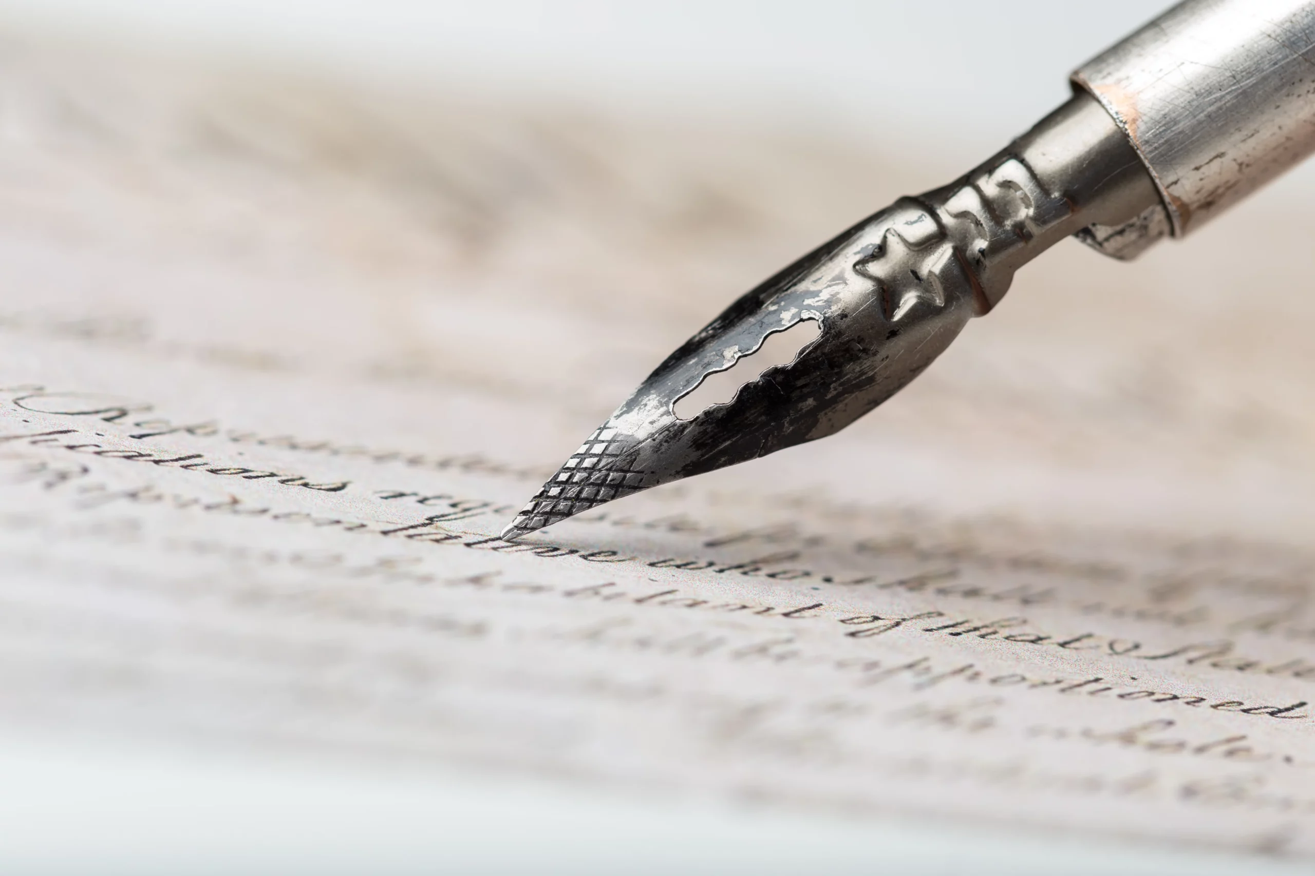 Close-up of a fountain pen signing a will, representing evidence used to prove a forged will in California