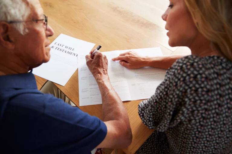 Home 4 Older couple reviewing legal documents related to protecting an elderly parent from undue influence in California